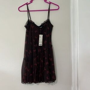 Cute new small petite dress with butterflies.